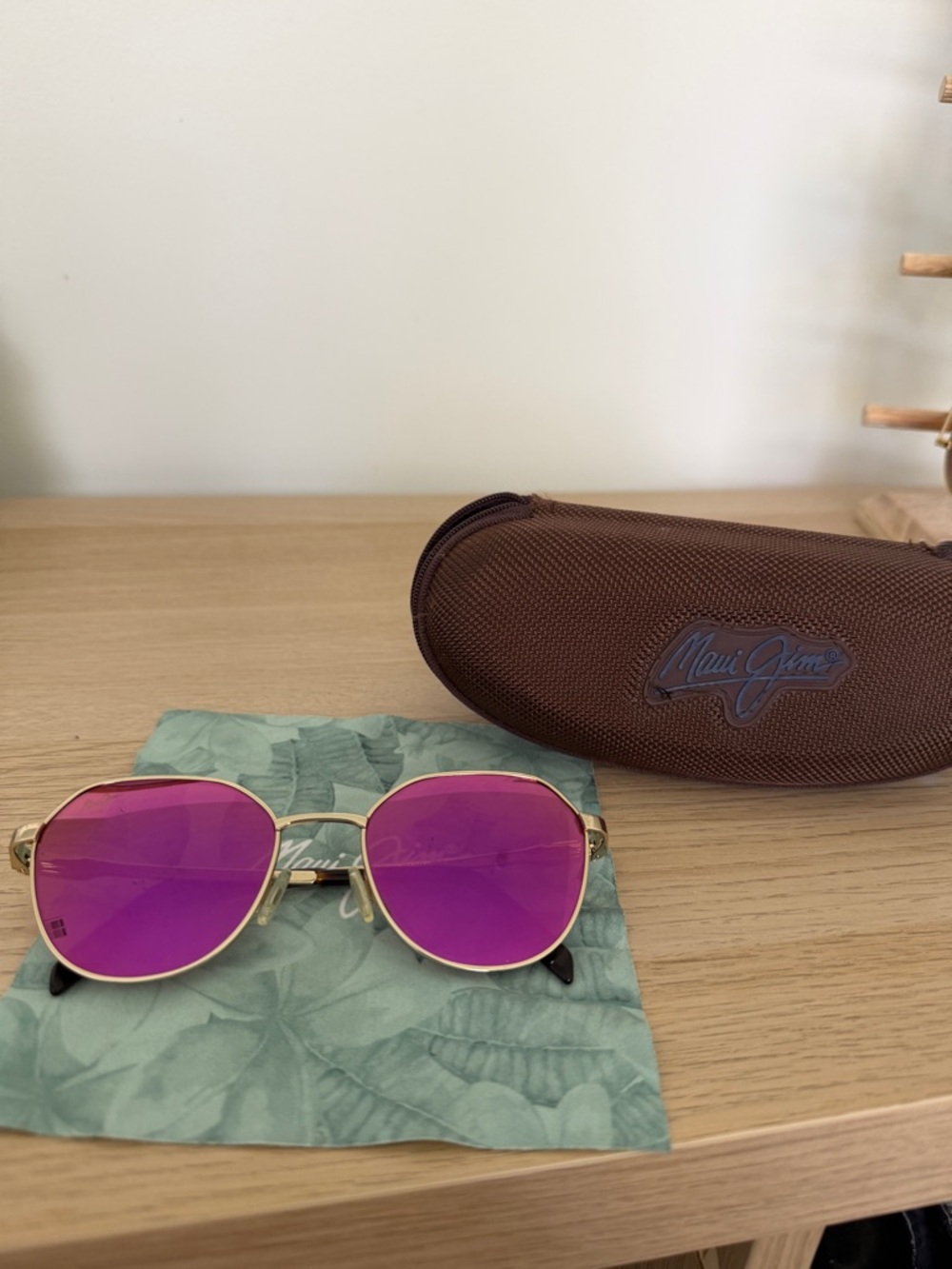 Maui Jim Gold Frame Sunglasses with Purple-Pink Lenses